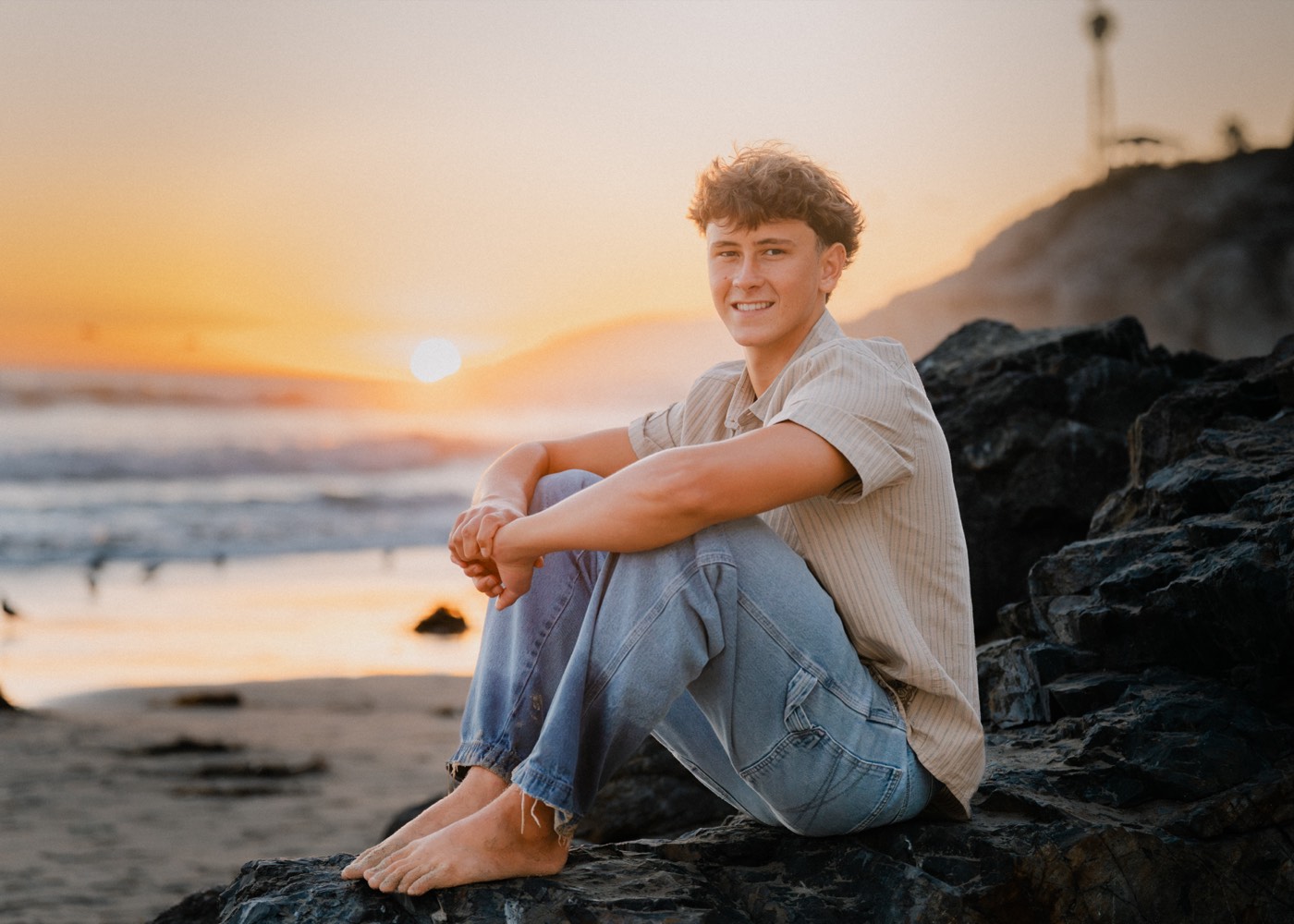 Senior portrait watching the sunset over the ocean — Central Coast senior photographer